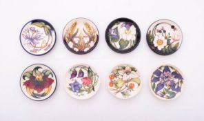 Eight Moorcroft circular coasters all with designs by Nicola Slaney and comprising Cotton,