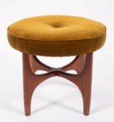 A teak and upholstered circular stool, probably Danish, circa 1960s; with green velvet coverings,