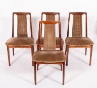 A G Plan teak extending dining table and four chairs,