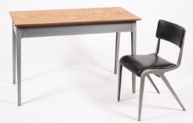 A metal and stained wood work table, mid 20th century; the rectangular top on straight,