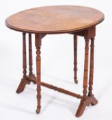 A Victorian burr walnut oval Sutherland