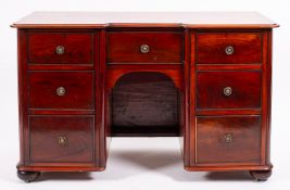 A Victorian mahogany kneehole desk, seco