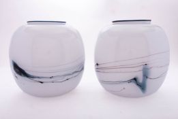 A pair of contemporary glass vases of ov