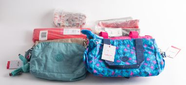 Kipling. A group of Kipling bags and pur