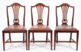 Two similar oak and elm ladder back elbo