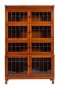 A 1920's mahogany four section bookcase of Globe Wernicke type, with a moulded cornice,