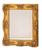 A rectangular gilt gesso picture frame, with later inset bevelled mirror plate,