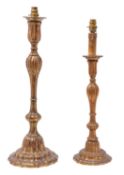 A graduated pair of Continental carved and giltwood table lamps, in 18th century taste,