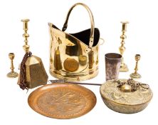 A repousse worked circular copper tray, possibly Newlyn, early 20th century,