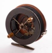 A Coxon Aerial wood and brass star back 4