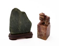 A Chinese green jade scholar's rock and a soapstone seal,