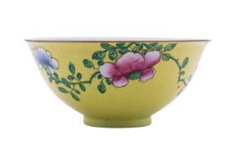 A Chinese famille rose yellow-ground sgraffito bowl,