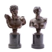 A pair of Continental patinated bronze busts after the Antique,