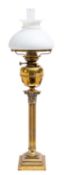 A Continental brass columnar oil lamp, late 19th century; with clear flue,