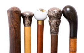 Five various walking sticks, comprising a silver mounted malacca example,