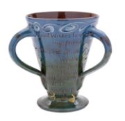 A C.H.Branham [Barnstaple] pottery tyg in the form of a three-handled loving cup