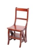 A Victorian style mahogany metamorphic library chair, with bar back,