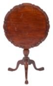 A 19th Century mahogany circular tea table, in the George III manner,