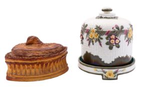 A Wedgwood majolica stilton dome and stand of osier moulded form with an encircling band of flowers