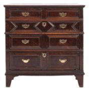 A 17th Century oak rectangular chest, with a moulded top,