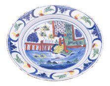 A Bristol [Limekiln Lane] polychrome delftware charger, circa 1730-40,
