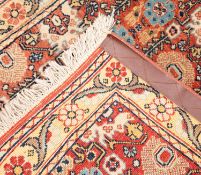 An Erivan runner, the brick red field with an all over geometric design,