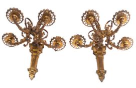 A pair of gilt metal five light wall appliques,