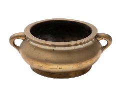 A Chinese bronze censer of compressed globular form with loop handles, apocryphal Xuande seal mark,