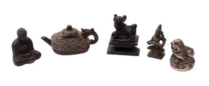 A group of five small Asian bronze and other objects including a seated Buddha inscribed 'Kamakura
