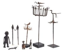 A collection of three iron staff heads, Yoruba People, Nigeria,
