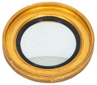 A Regency giltwood circular convex mirror,