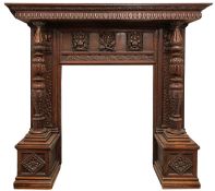 A 19th Century oak fire surround, with rectangular mantle with lunette carved frieze,