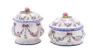 Two matched French Aprey faience jars and covers,