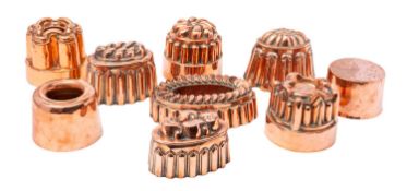 A collection of nine Victorian copper food moulds,