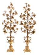A pair of gilt metal eight light candelabra in late 18th century taste,