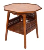 An Edwardian walnut octagonal occasional table, the top with a moulded edge on square splayed legs,