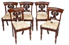 A set of five George IV mahogany dining chairs,