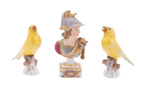 A small Meissen bust of Mars and a pair of Meissen models of canaries,