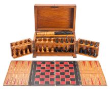 A Victorian oak cased games compendium,