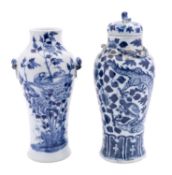 A Chinese blue and white vase and cover and one other,