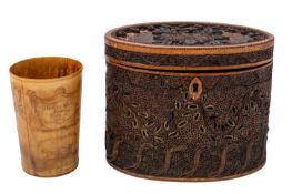 A George III gilt paperscroll decorated sycamore and pine tea caddy, circa 1800: of oval section,