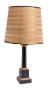 A black and gold painted metal columnar table lamp, in early 19th century taste,