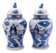 A pair of large Chinese blue and white baluster vases and covers,