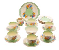 A Clarice Cliff Spring Crocus part tea service, comprising six cups, six saucers, milk jug,