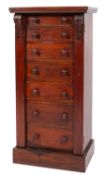 A Victorian walnut Wellington chest, fitted with seven drawers, enclosed by pilaster locking stile,