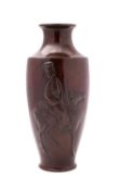 A Japanese bronze vase, Meiji period decorated in relief with a lady riding a mythical Kirin,