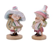 A pair of Royal Crown Derby figures of The Mansion House dwarves,