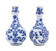 A pair of Chinese blue and white guglets, Kangxi with tall 'garlic' necks,