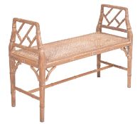 A Contemporary beechwood simulated bamboo window seat, having a cane panel seat, 90cm length,