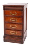 An Edwardian oak filing chest, of small size, fitted with four drawers with brass handles,